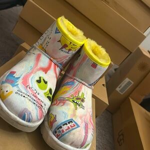 A HUGG brand boot size 9 worn a couple times different characters and colors